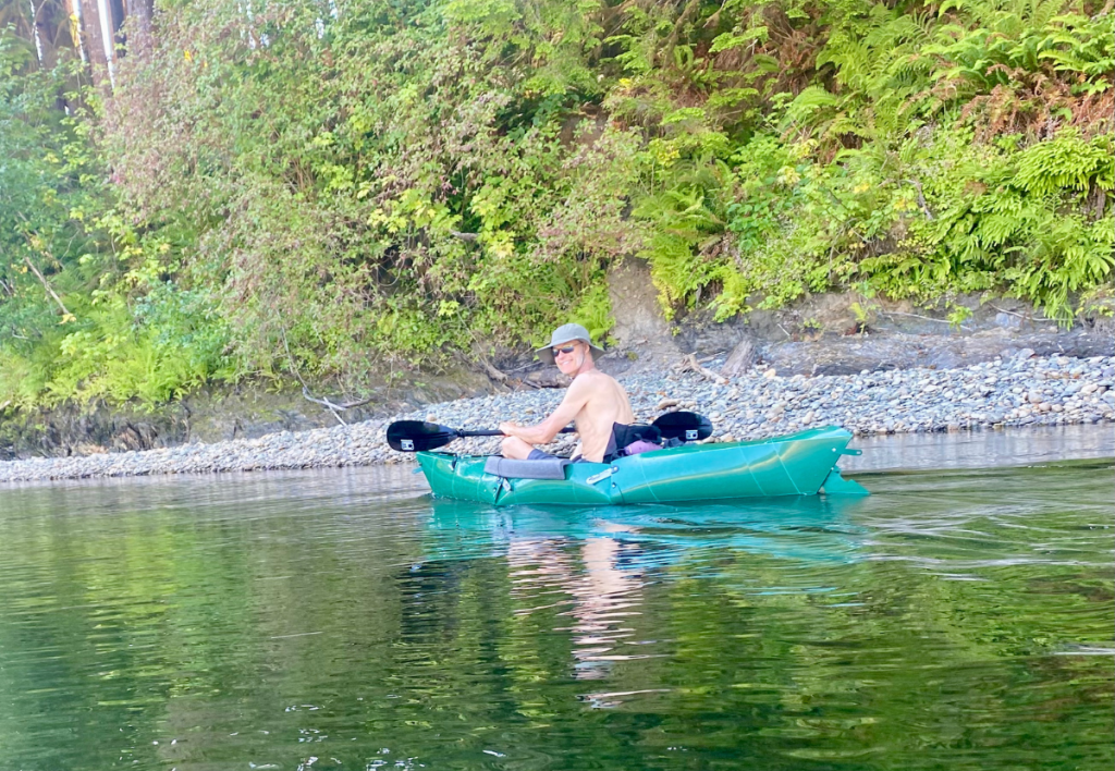 arne-pedersen-hypnotherapy-victoria-kayak-san-juan-river-mindful-adventure Arne Pedersen kayaking on the San Juan River, smiling with joy—reflecting emotional freedom and the mindful adventure of inner growth.